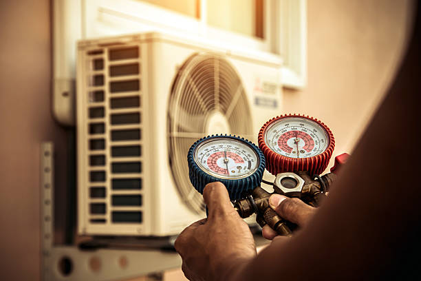 Professional Ac Installation technician working in Lowell, AR